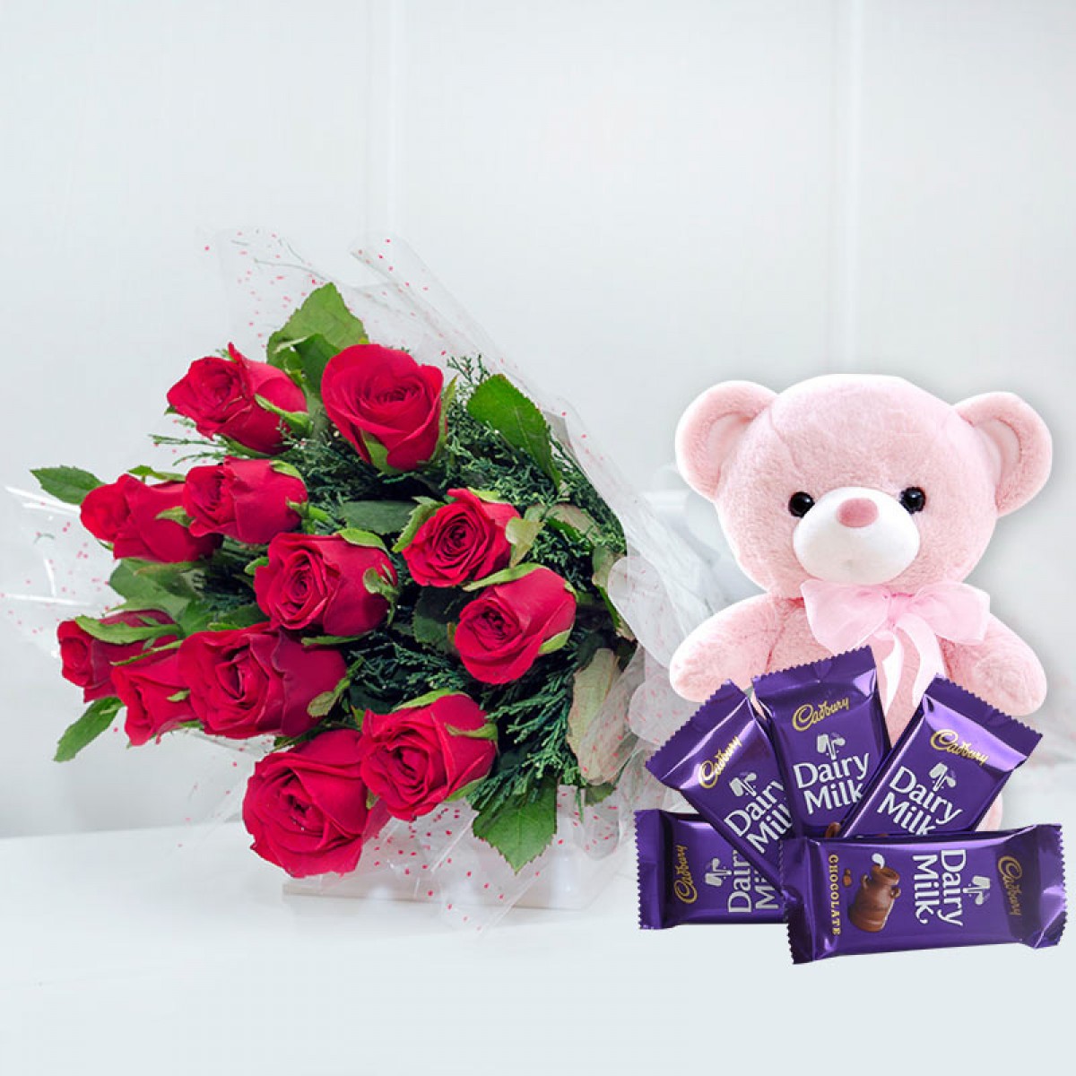 https://www.wishingcart.in/product/pink-roses-teddy-chocolate-combo